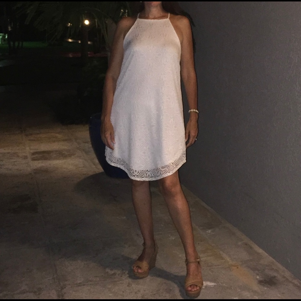 Sleeveless white summer dress
